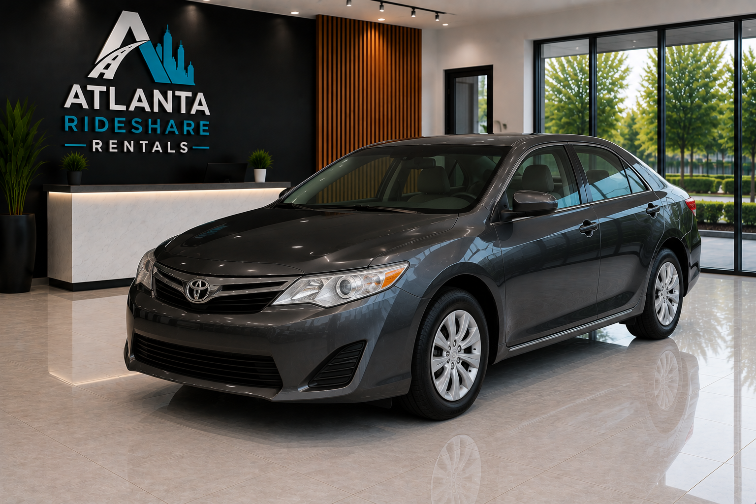 Dark gray Toyota Camry rental vehicle